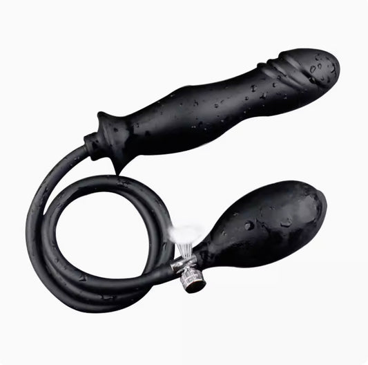 Inflatable anal plug